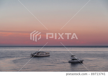 white motor yacht and cruise liner at sea on summer 89713741