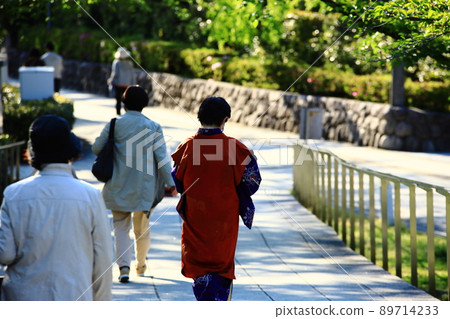 A woman in the rear 89714233