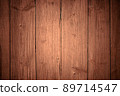 Old wooden red, brown background of boards with cracked and peeling paint. Wooden texture. Fence 89714547