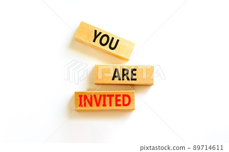 You are invited symbol. Concept words You are invited on wooden blocks. Beautiful white table white background. Business and you are invited concept. Copy space. 89714611
