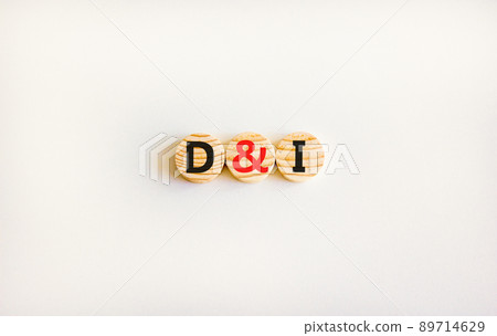 D and I, Diversity and inclusion symbol. Concept words D and I, diversity and inclusion on wooden circles on beautiful white background. Business, D and I, diversity and inclusion concept. 89714629