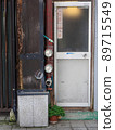 Old fire hydrants and doors in an old town 89715549
