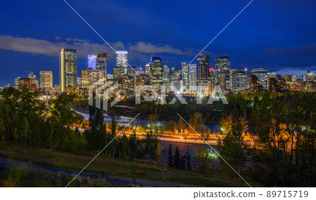 Skyline of Calgary with Bow River in Canada at night 89715719