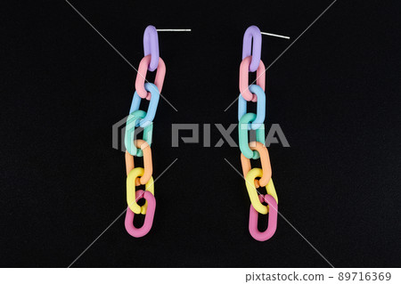 Jewelry earrings and costume jewelry on a black background Jewelry earrings and costume jewelry on a black background 89716369