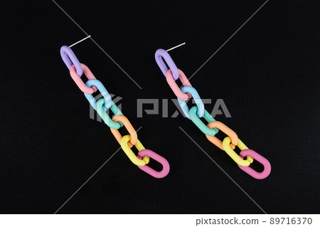 Jewelry earrings and costume jewelry on a black background Jewelry earrings and costume jewelry on a black background 89716370