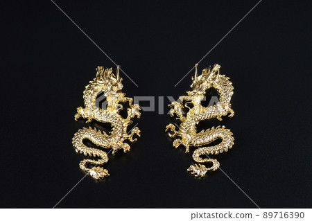 Jewelry earrings and costume jewelry on a black background 89716390