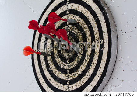 Dart board with hanging on the wall 89717700