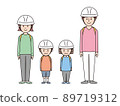 A family of four wearing a helmet for disaster prevention 89719312