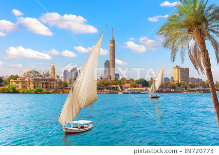 Feluccas in the Nile in front of the Tower of Cairo, Egypt Feluccas in the Nile in front of the Tower of Cairo, Egypt 89720773