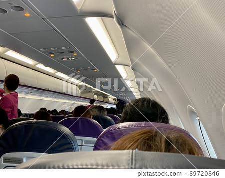 Inside the plane waiting for takeoff PEACH inside the plane 89720846