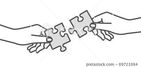 一隻手拿著一塊拼圖。比喻合作與協作。 一隻手拿著一塊拼圖。比喻合作與協作。 89721084