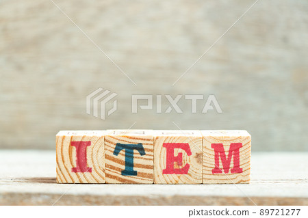 Alphabet letter block in word item on wood background 89721277