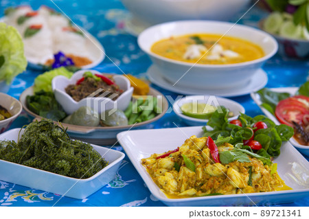 Fried crab in yellow curry Fried crab in yellow curry 89721341