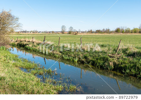 The Creek Gete through the fields of the Flemish countryside The Creek Gete through the fields of the Flemish countryside 89722979