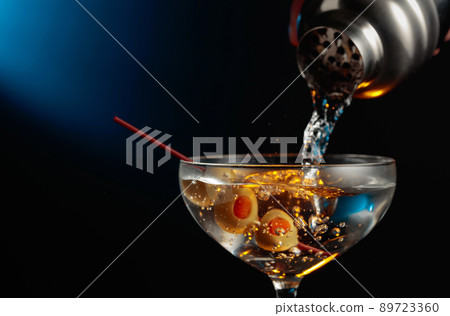 Martini with green olives. 89723360