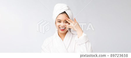 Spa skincare beauty Asian woman drying hair with towel on head after shower treatment. Beautiful multiracial young girl touching soft skin 89723638