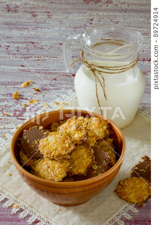 Cookies and milk in a glass jar 89724914