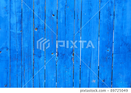 Old wooden blue background of boards with cracked and paint. Fence. Wooden texture. Old wooden blue background of boards with cracked and paint. Fence. Wooden texture. 89725049