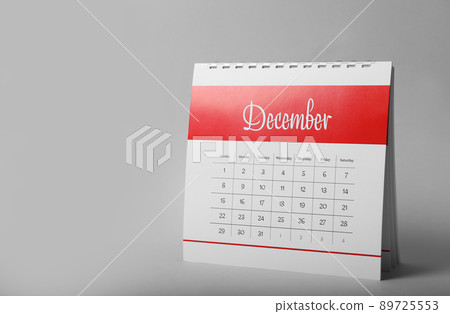 Paper calendar on grey background, space for text. Planning concept 89725553