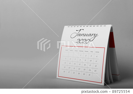 Paper calendar on grey background, space for text. Planning concept 89725554