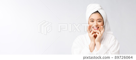 Spa skincare beauty Asian woman drying hair with towel on head after shower treatment. Beautiful multiracial young girl touching soft skin 89726064