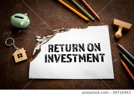 Return on Investment. Business concept. Office supplies on a rusty metal background 89726463