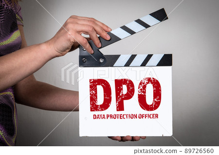 DPO Data Protection Officer Concept. Female hands holding movie clapper 89726560