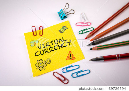 Virtual Currency. Text and drawing on a ellow note sheet Virtual Currency. Text and drawing on a ellow note sheet 89726594