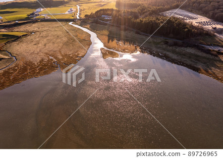 Aerial view of Dunfanaghy Bay in County Donegal at sunset - Ireland 89726965