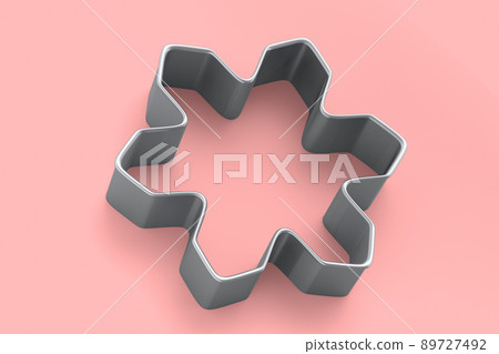 Metal cookie cutters for homemade Christmas biscuit on a pink background. Metal cookie cutters for homemade Christmas biscuit on a pink background. 89727492