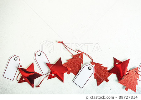 Holiday card concept with gift tags Holiday card concept with gift tags 89727814