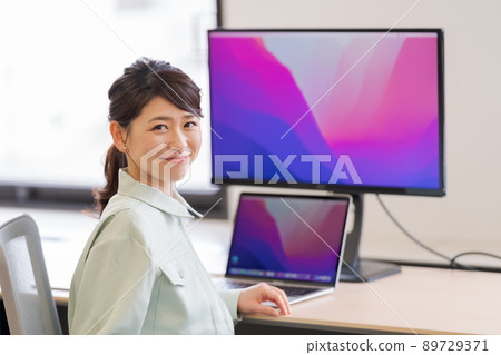 Women in work clothes and office 89729371