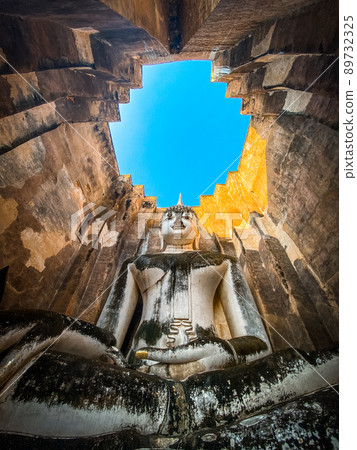 Wat Si Chum temple and big Buddha in Sukhothai historical park, Thailand 89732325