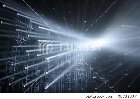 Lighting of laser beam that illuminates the stage colorfully Lighting of laser beam that illuminates the stage colorfully 89732337
