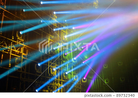 Lighting of laser beam that illuminates the stage colorfully Lighting of laser beam that illuminates the stage colorfully 89732340