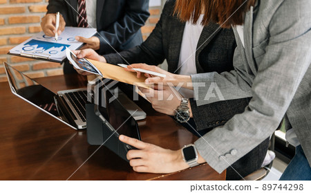 .Brainstorming process at sunny office. Coworkers work together modern office.Business team meeting,work process... .Brainstorming process at sunny office. Coworkers work together modern office.Business team meeting,work process... 89744298