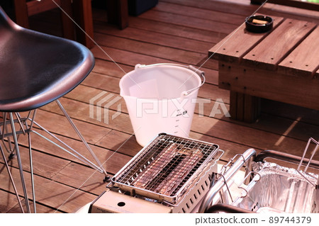 BBQ and preparation on the wooden deck of the house 89744379