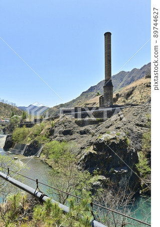 Ashio Copper Mine Ruins Chimney of the smelter ruins on the Watarase River 89744627