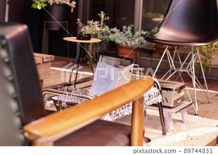 BBQ and preparation on the wooden deck of the house 89744831