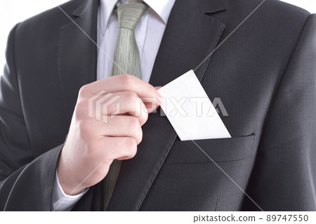 close up.businessman with a business card form close up.businessman with a business card form 89747550