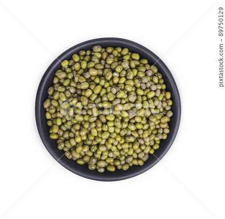 Mung bean seeds in a black cup isolated on white background. Top view Mung bean seeds in a black cup isolated on white background. Top view 89750129