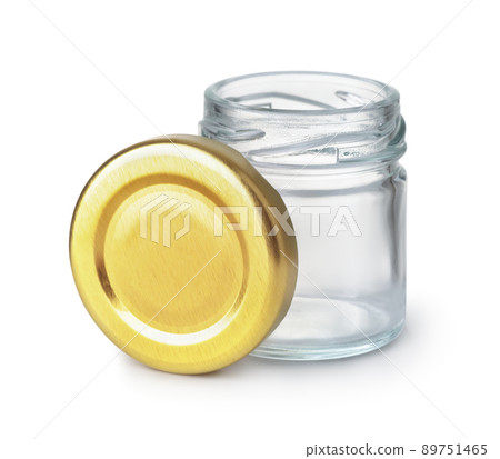 Open empty glass jar and blank golden lid 89751465