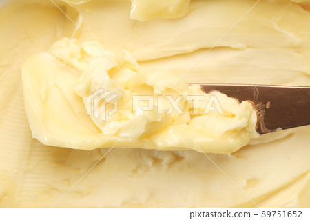 detail shot of fresh butter in a container  89751652