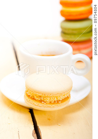 colorful macaroons with espresso coffee colorful macaroons with espresso coffee 89754804