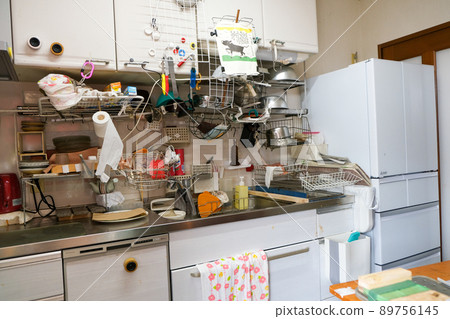 A messy kitchen with lots of things 89756145