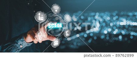 SCADA Supervisory control and data acquisition technology concept, Person hand pointing on SCADA icon on virtual screen.. 89762899