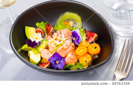 Salmon ceviche with avocado, kumquat, figs, kiwi fruit Salmon ceviche with avocado, kumquat, figs, kiwi fruit 89763389