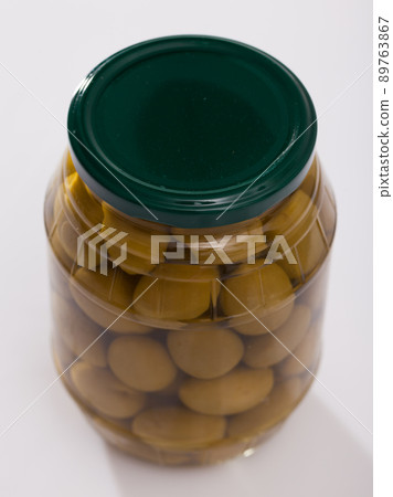 Glass jar of olives Glass jar of olives 89763867