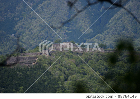 View Takeda Castle Ruins from Tachiunkyo, from the mountains heading to the first observatory View Takeda Castle Ruins from Tachiunkyo, from the mountains heading to the first observatory 89764149
