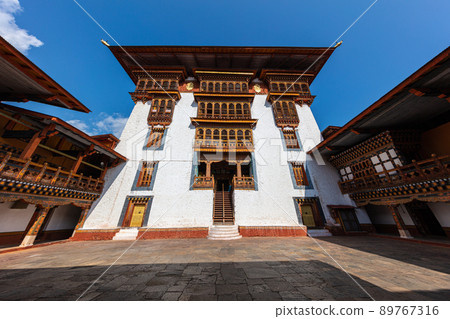 Bhutan - October 24, 2021: Inside  Punakha Dzong in Bhutan. Punakha Dzong Monastery, one of the largest monasteries in Asia. The delicate decoration inside of punakha dzong, Bhutan. traditional facade 89767316